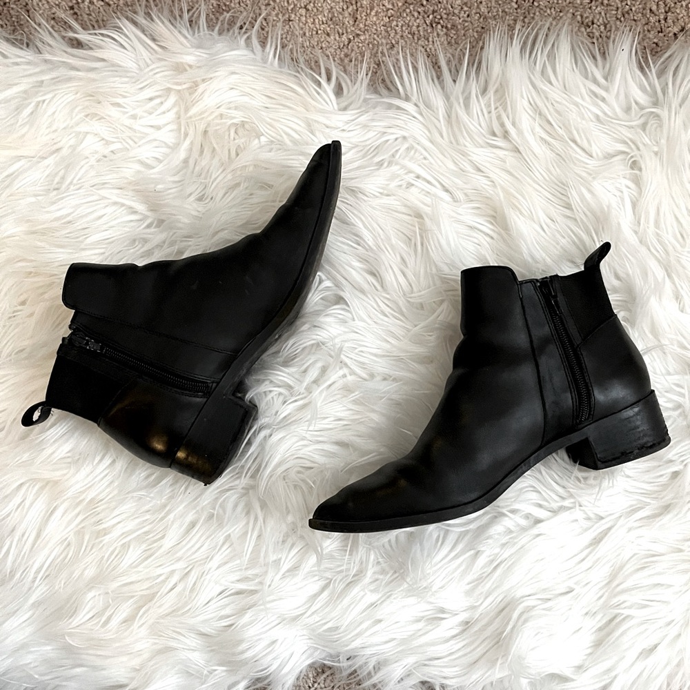 Pointed toe flat black ankle booties